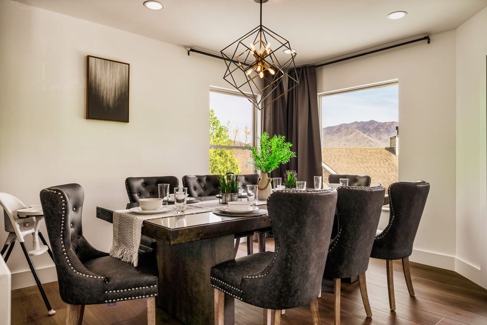 Spacious Dining Table with Natural Lighting and plenty of seating space
