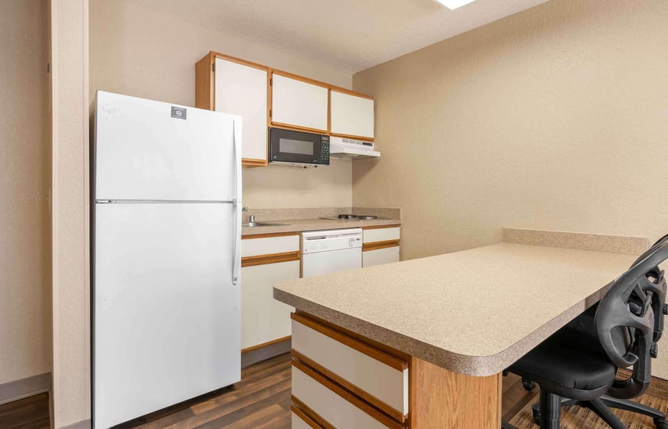 Suite, 1 Queen Bed with Sofa bed, Non Smoking | Private kitchen | Fridge, microwave, stovetop, coffee/tea maker