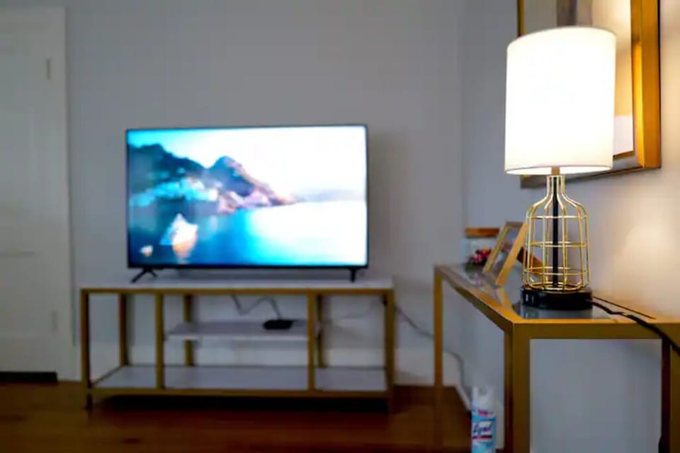 Smart TV and entrance table with light