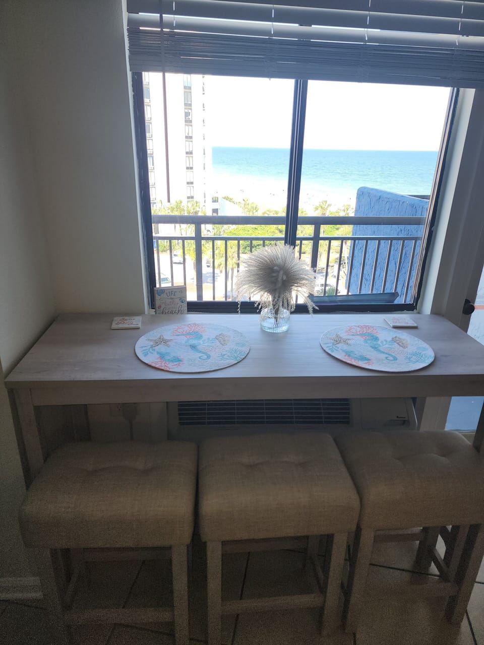 Enjoy a meal or cocktail at the new bar inside condo overlooking the Ocean!!