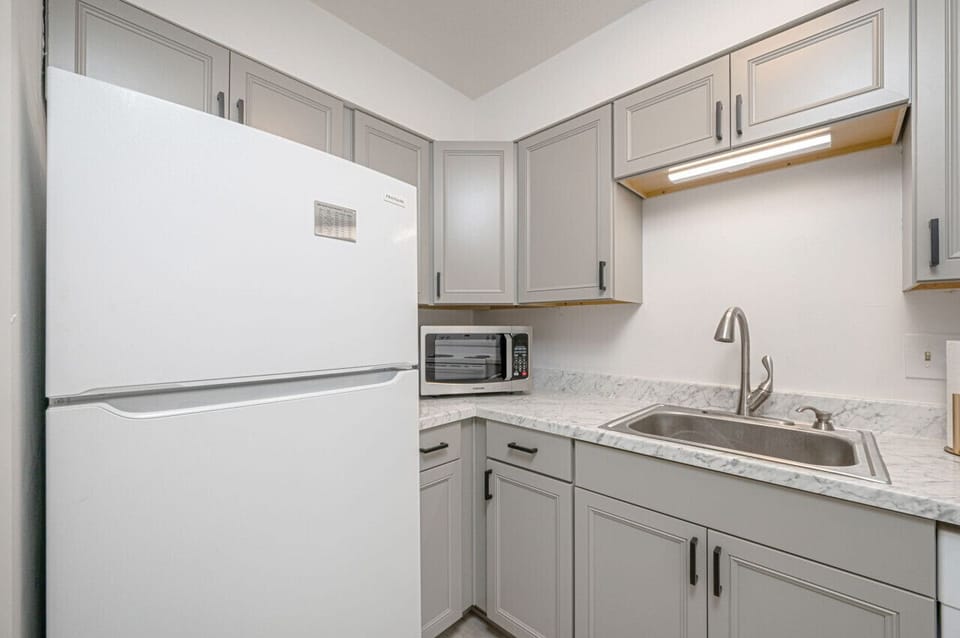 The kitchen is equipped with a refrigerator to keep your food fresh.
