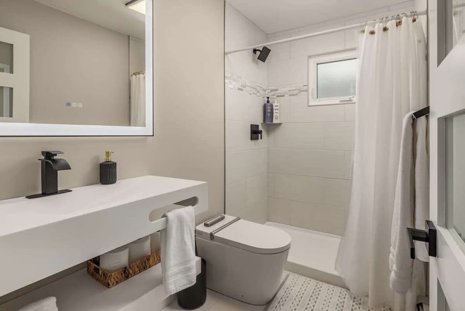 Brand new bathroom with smart bidet toilet