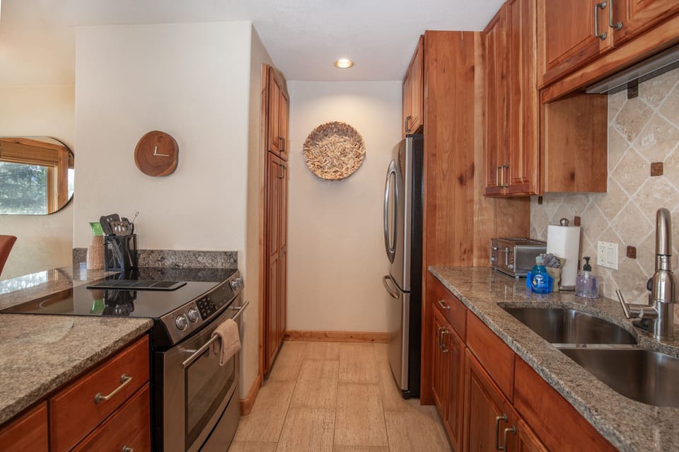 Granite counter tops, stainless steel appliances and all the gadgets you need.