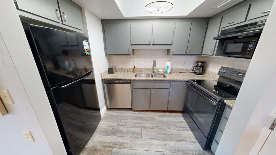 Kitchen is fully stocked for all your cooking needs.