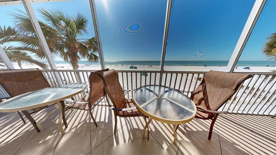 Enjoy your morning coffee on the screened in Balcony.