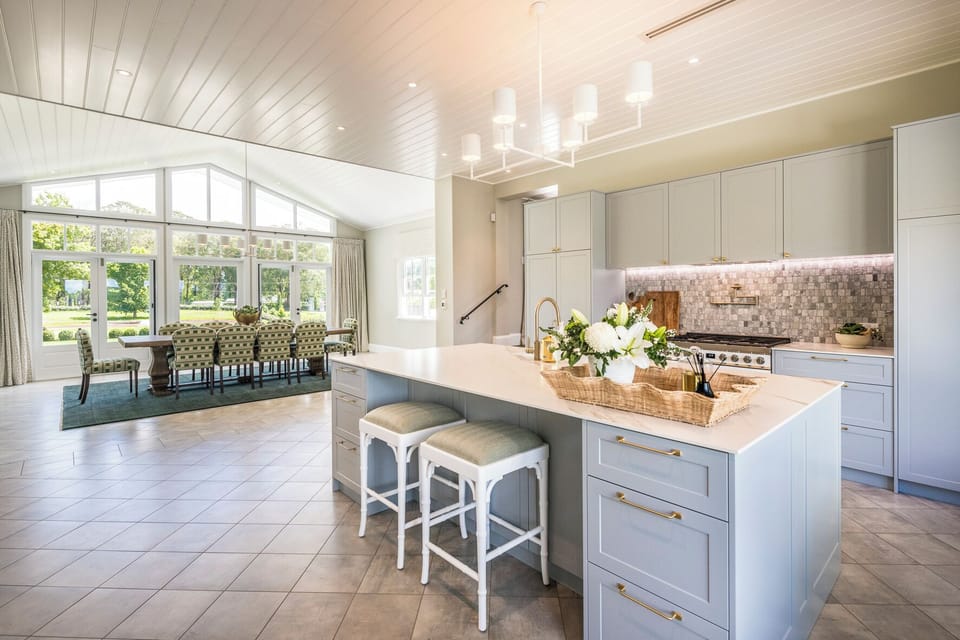 Looking from the kitchen towards the lake past the enormous dining table