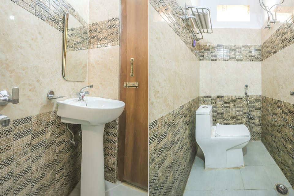 Deluxe Room | Bathroom | Shower, rainfall showerhead, free toiletries, towels