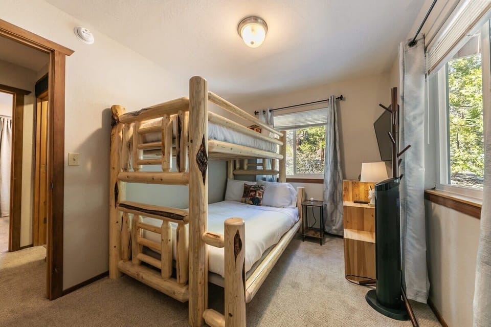 The fourth bedroom boasts a twin-over-full bunk bed and a TV with Roku.