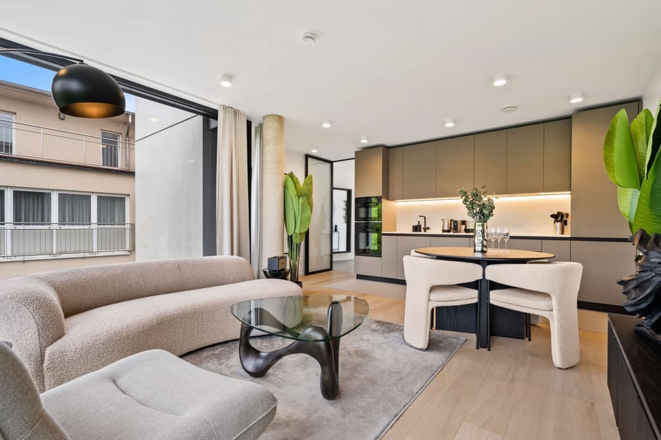 Seamless living: from plush sofa to sleek kitchen, find your flow.