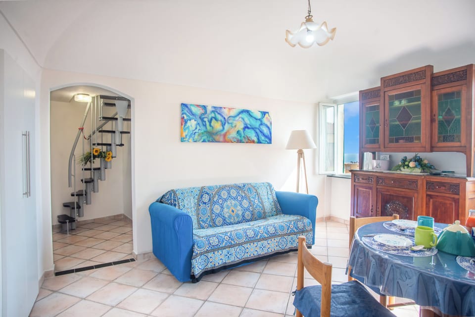 Family Apartment, 2 Bedrooms, Microwave (Casa Felice) | Living area | 21-inch flat-screen TV with digital channels