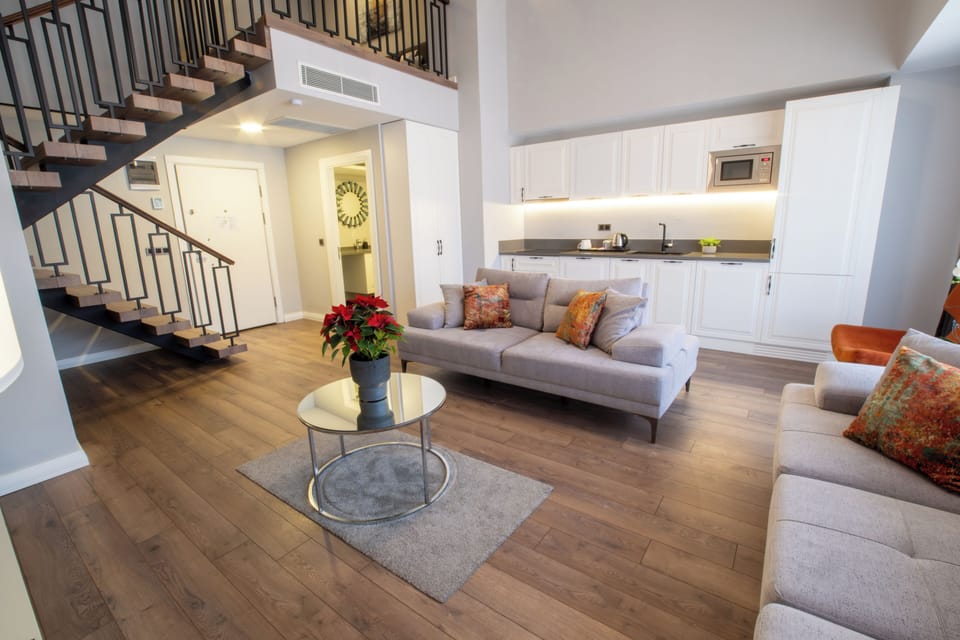 Exclusive Loft | Premium bedding, minibar, in-room safe, blackout drapes