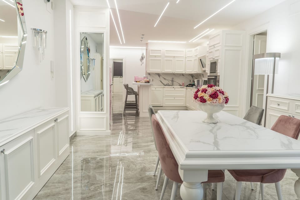 Deluxe Apartment, City View | Living room | 55-inch flat-screen TV with digital channels