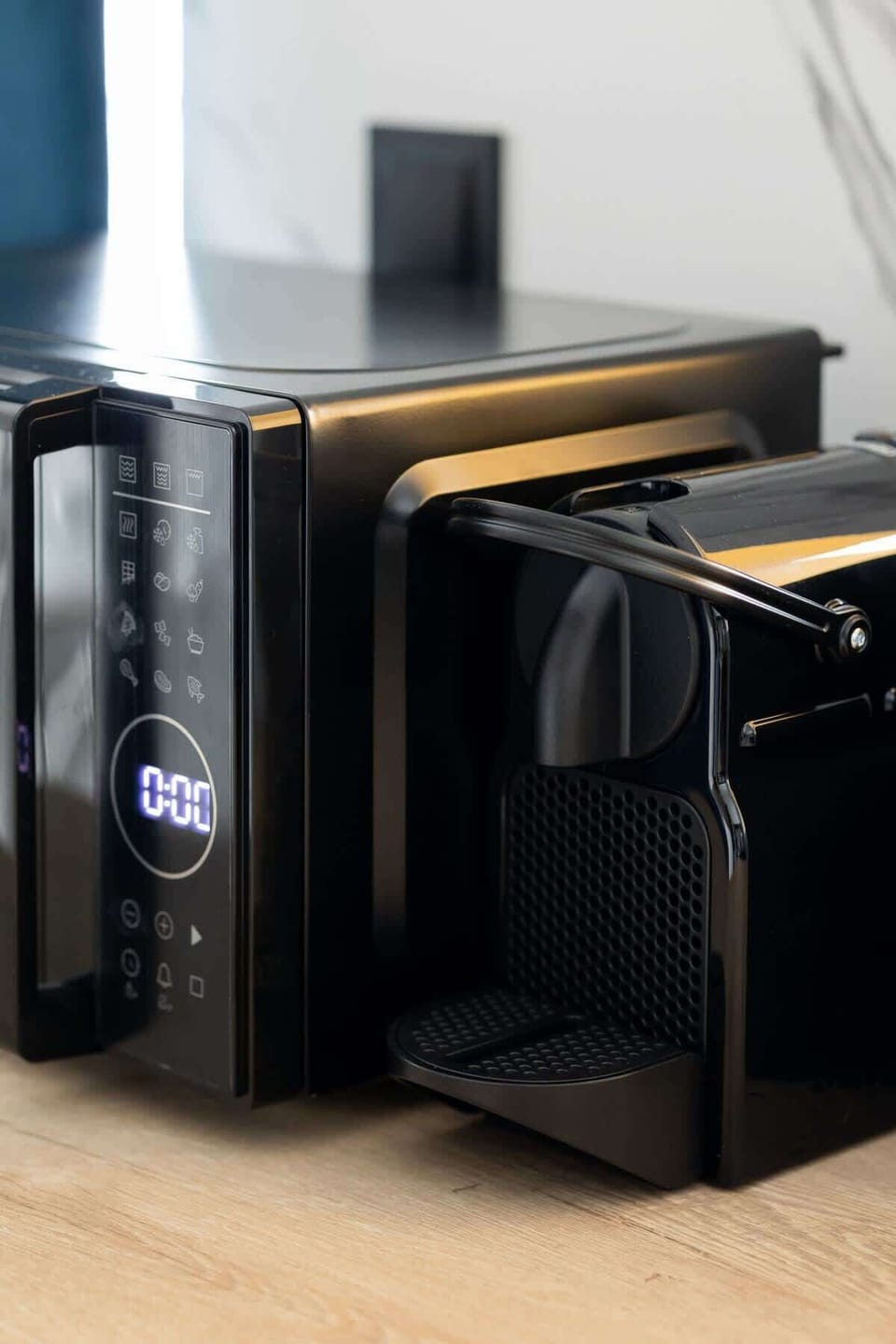A close-up of the built-in microwave in the kitchen. Easy to use and ideal for heating up meals quickly.