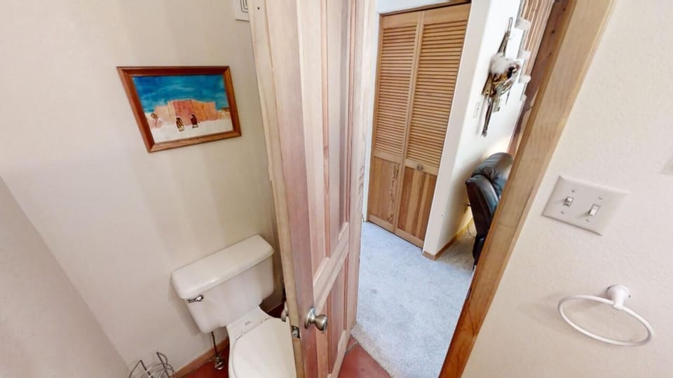 Your private bathroom features coastal touches and connects conveniently to your bedroom, with closet storage just steps away for a seamless stay.