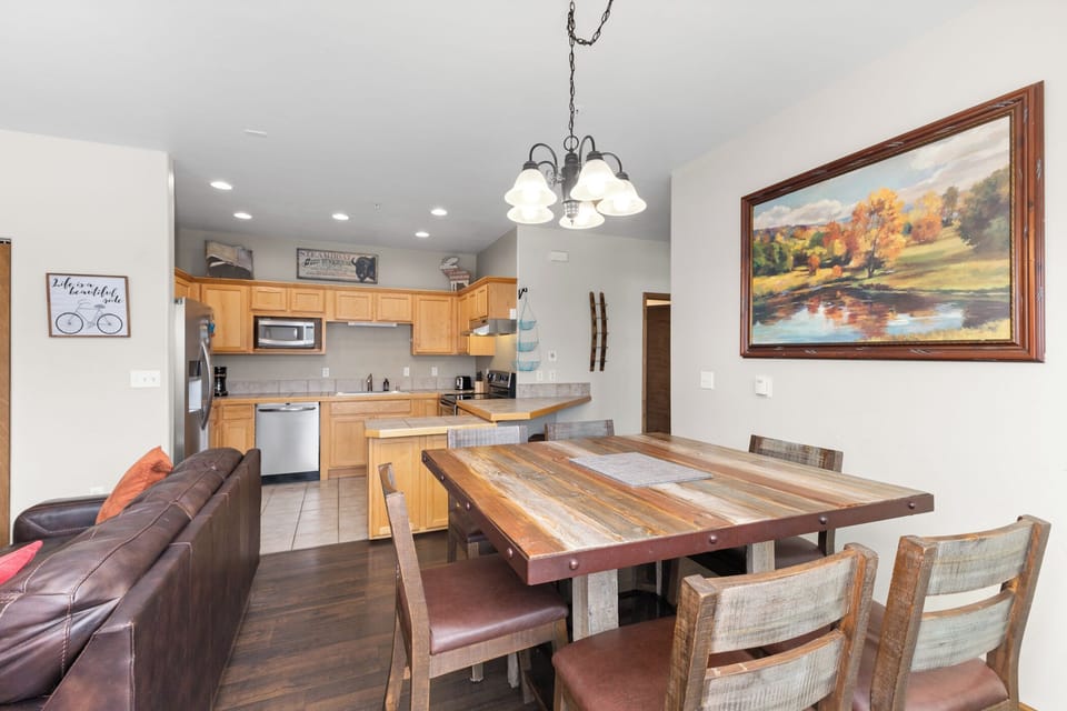 Dining Area with Kitchen in background