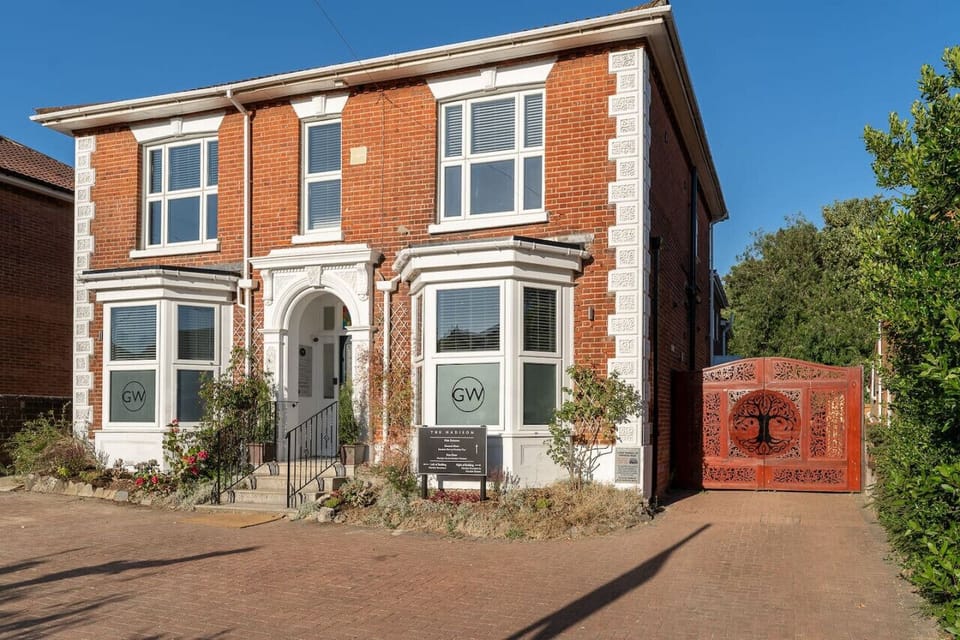 Characterful exterior with front and rear parking areas