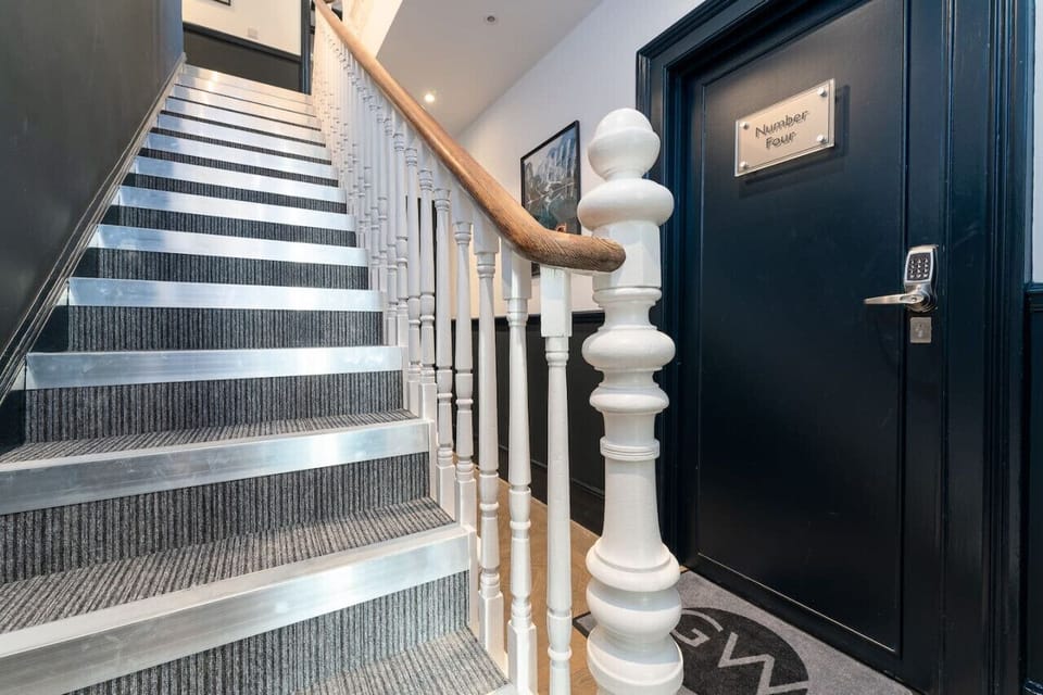 Flight of stairs to the first floor studios