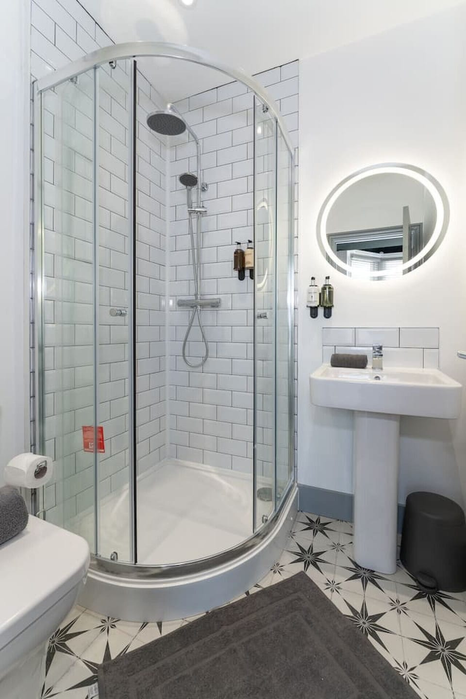 Bright modern bathroom with spacious shower