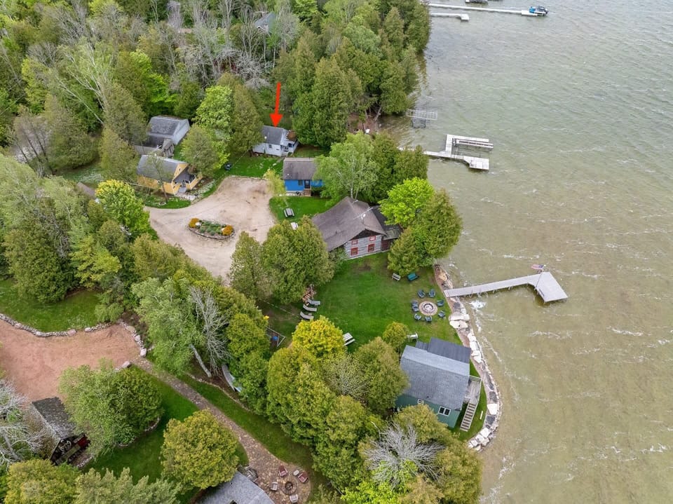Shared fire pit, Dock and kids playground with other cabins on the property!