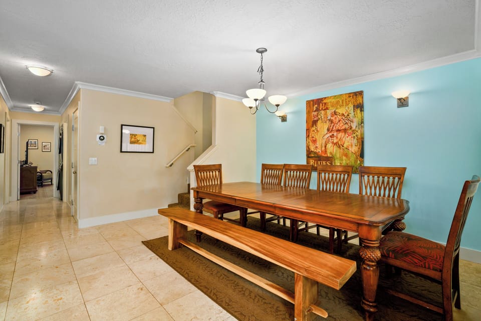 Island artwork and decor adorn the walls.