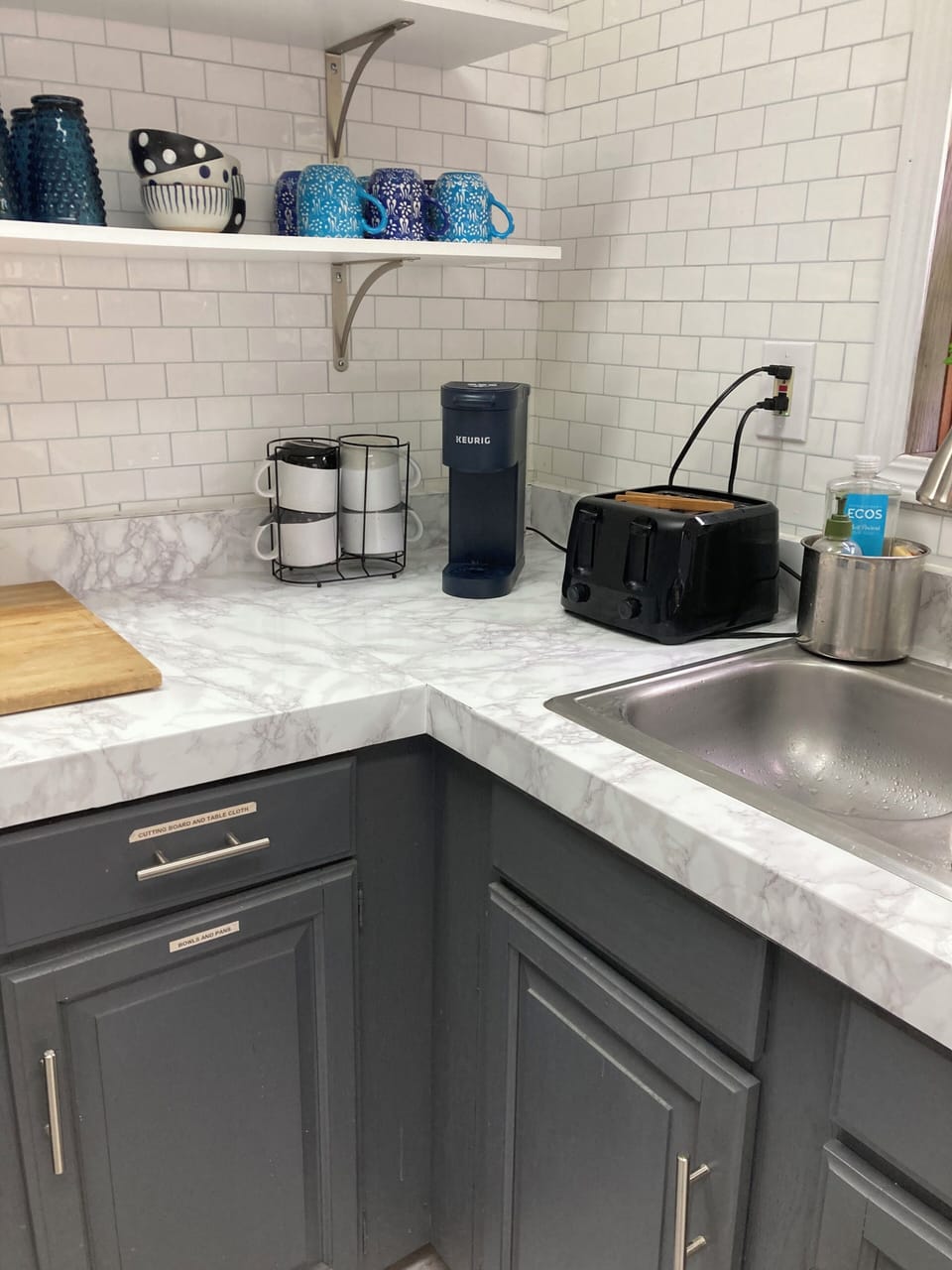 Corner of kitchen with Keurig and toaster