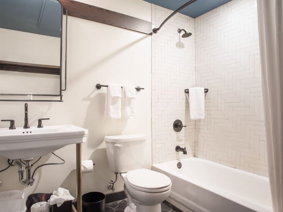 Bright and clean bathroom with classic subway tiles and modern amenities