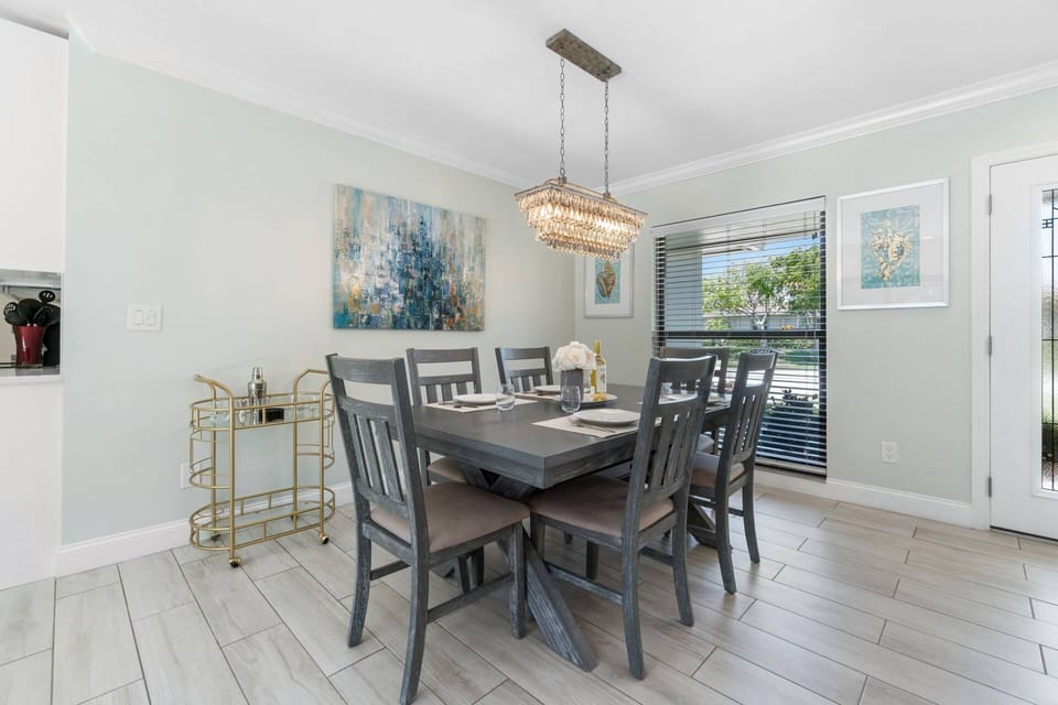 The dining area is perfect for casual meals or elegant dinners alike.