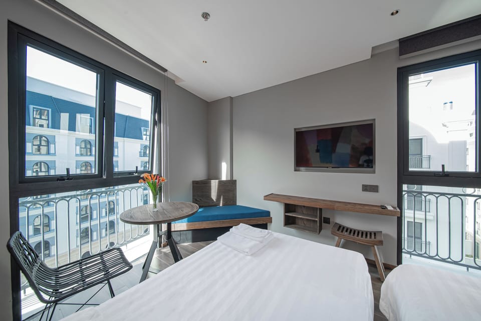 Deluxe Room, City View | Premium bedding, down comforters, memory foam beds, in-room safe
