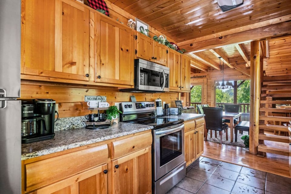 Enter the cabin through the fully-equipped kitchen.