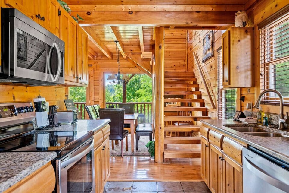 The kitchen includes a full suite of stainless steel appliances and is the perfect spot to make meals.