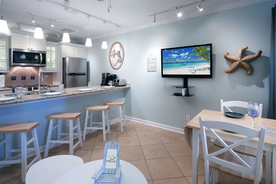 Open concept den and kitchen.