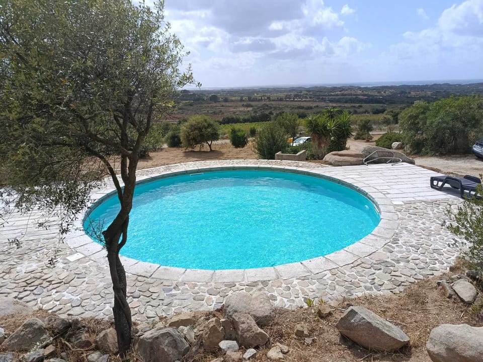 Seasonal outdoor pool, pool umbrellas, sun loungers