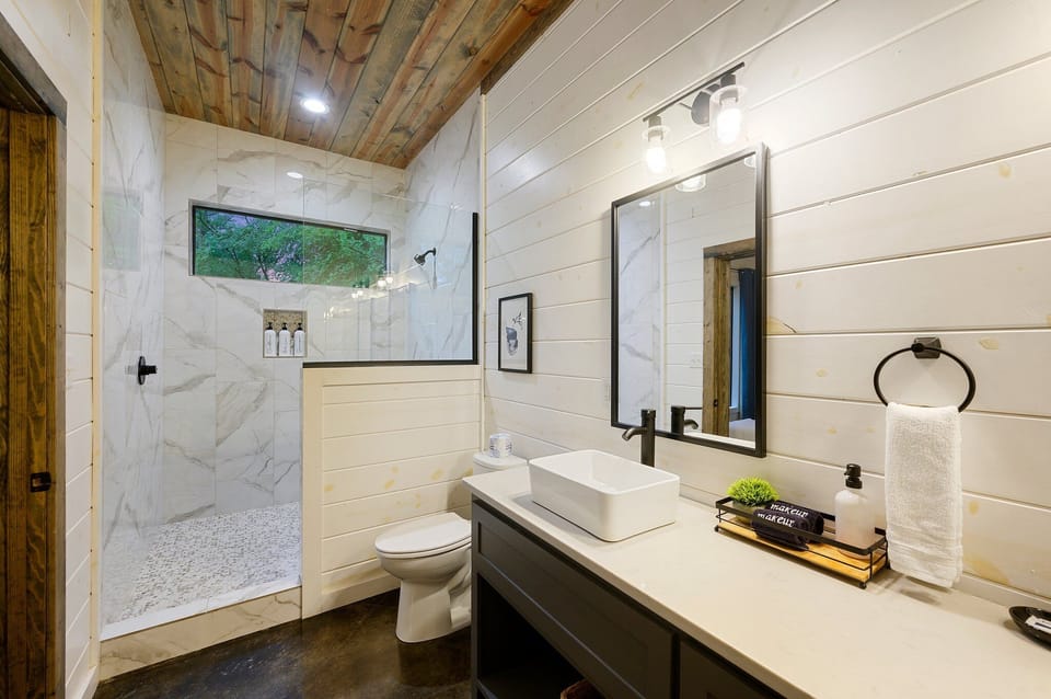 Spa-like ensuite bathrooms with walk-in showers & premium toiletries
