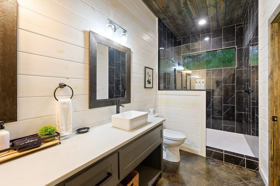 Spa-like ensuite bathrooms with walk-in showers & premium toiletries
