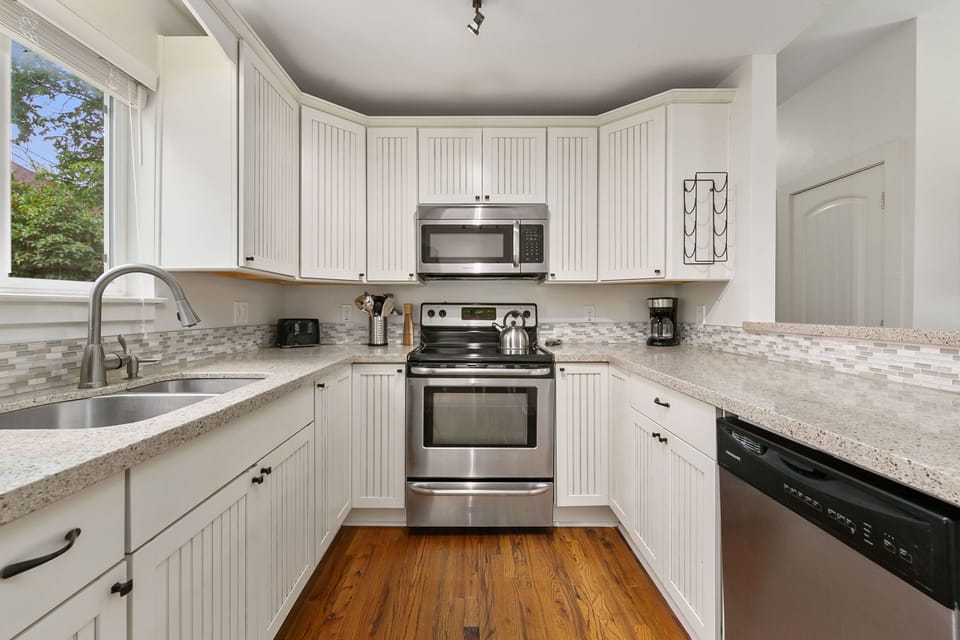 Kitchen with Stainless Steel Appliances and a Breakfast Bar