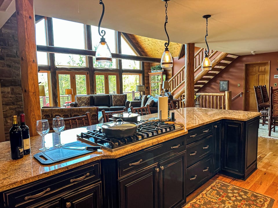 Gormet kitchen is open to living room, dining room and screened porch. 