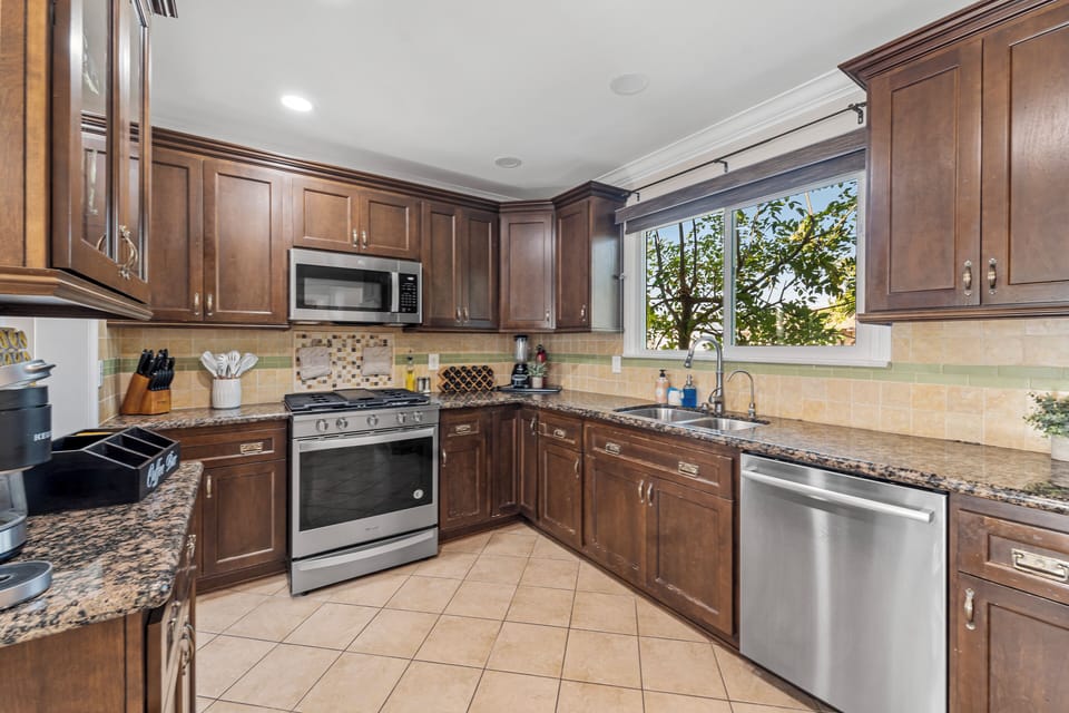 Kitchen with Stove, Refrigerator and Dishwasher