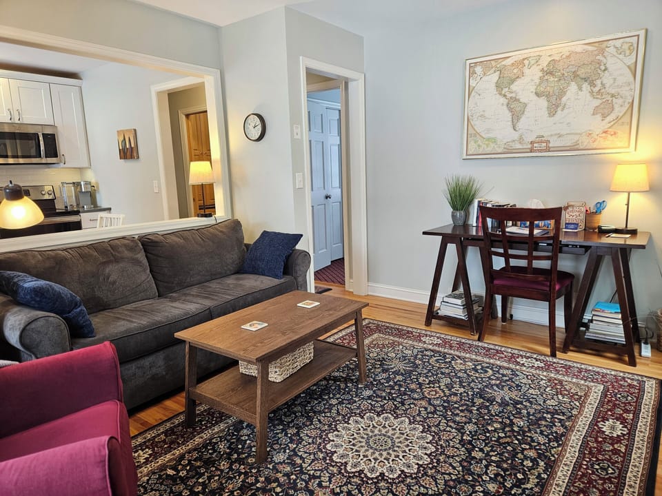 Living room - Includes full-size pullout sofa bed with 6" memory foam mattress.