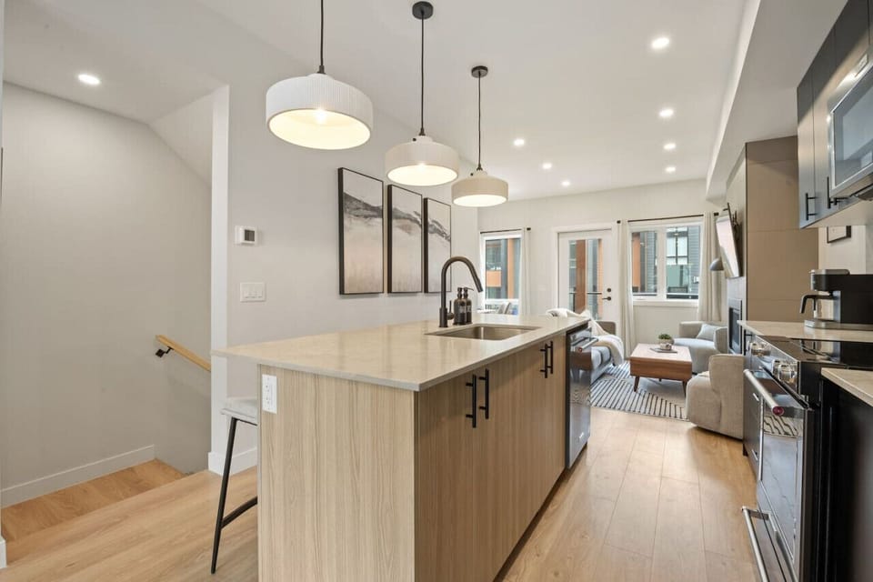 Full kitchen including a drip coffee maker, ground coffee, sugar, tea, ketchup, relish & mustard.