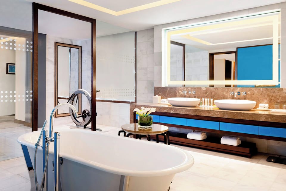 Separate tub and shower, deep soaking tub, rainfall showerhead