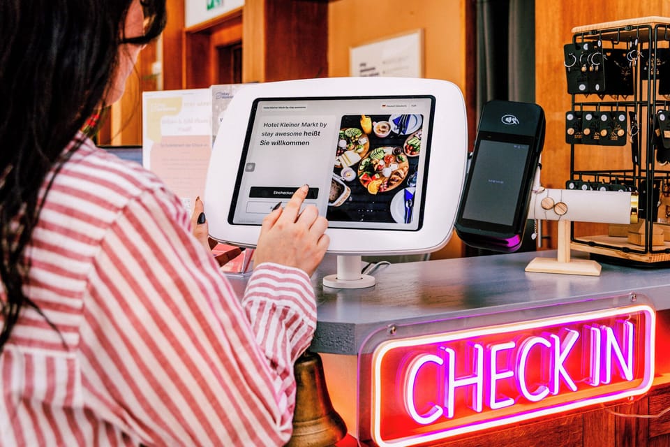 Check-in/check-out kiosk