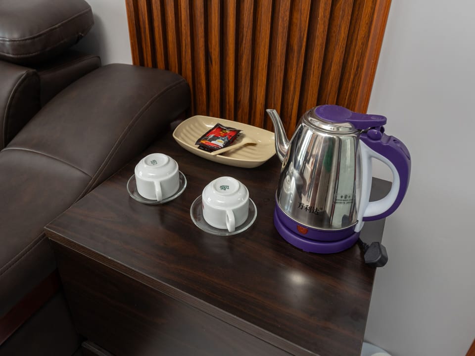 Desk, laptop workspace, free WiFi, bed sheets