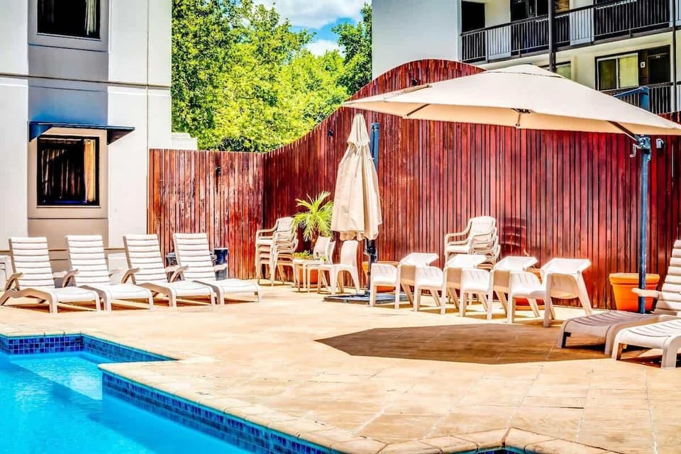 Dive into relaxation! Your refreshing pool escape awaits.