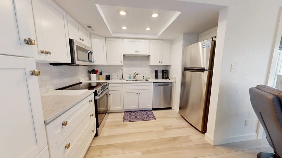 Kitchen is fully stocked for all your cooking needs.
