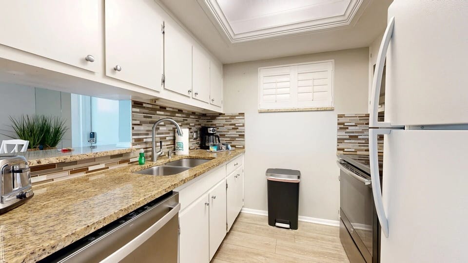Kitchen is fully stocked for all your cooking needs.