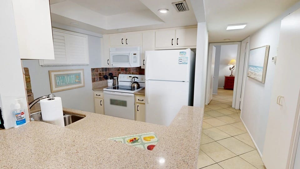 Kitchen Fully stocked for all your cooking needs.