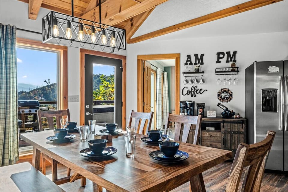 The dining area has direct mountain views. There is an AM/PM bar just off the kitchen.