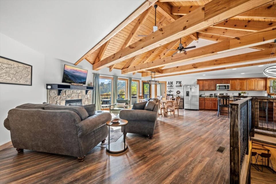 The front door opens to the large, open living area with plenty of space and beautiful views.