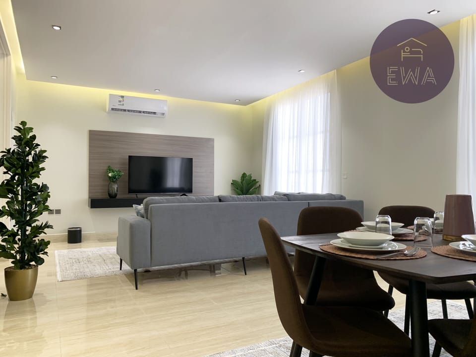 Design Apartment, 3 Bedrooms | Living area | Flat-screen TV