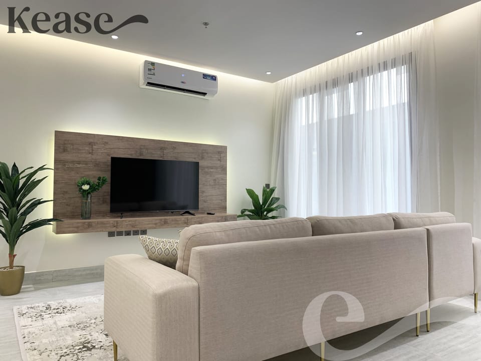 Design Apartment, 3 Bedrooms | Living area | Flat-screen TV
